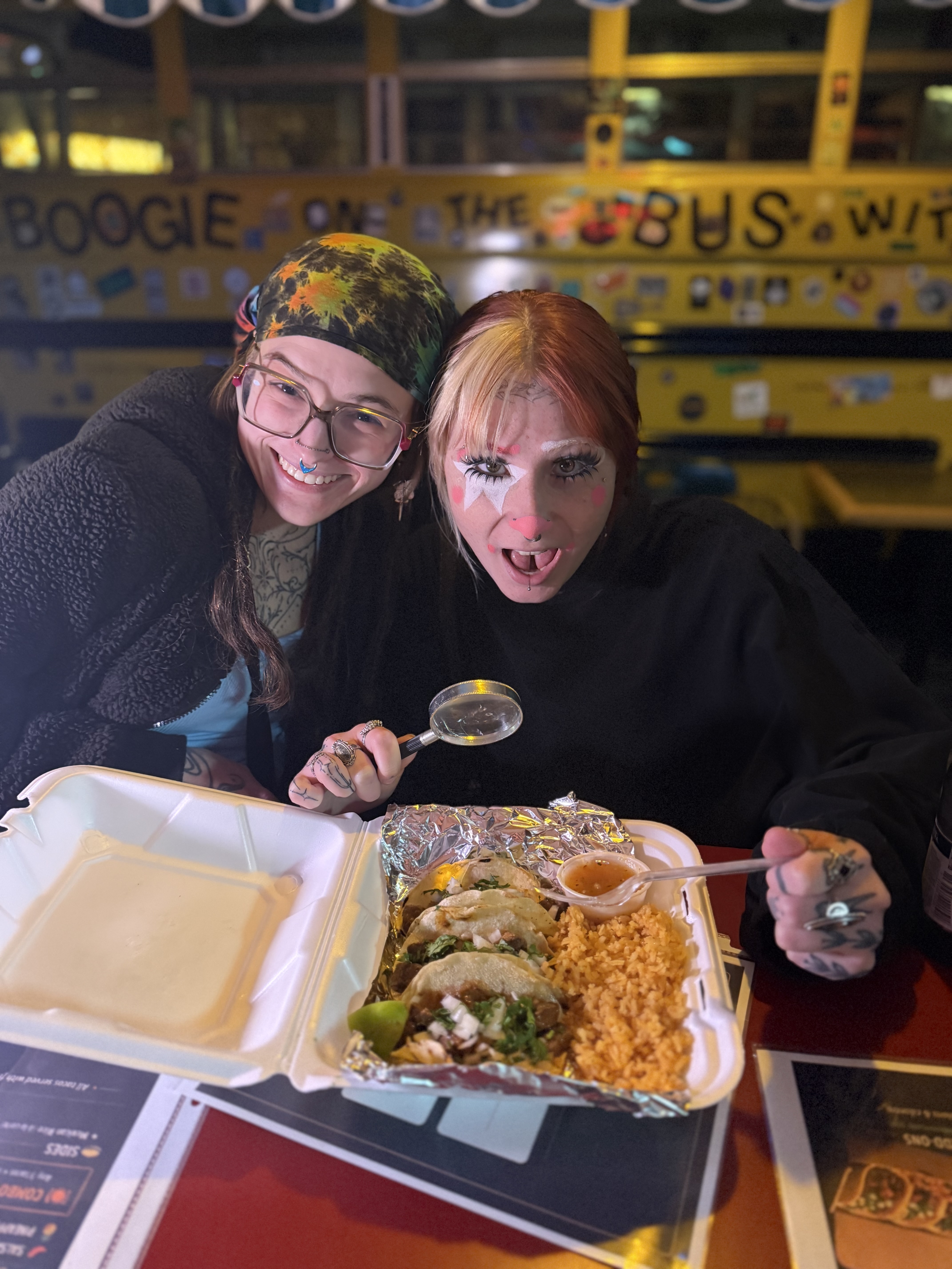 Two customers enjoying Tailored Tastes food at a venue